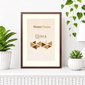 May include: A rectangular dark brown poster frame with a cream-coloured mat board. The insert features the text "Poster Frame" at the top, an "OSUK" logo in the centre, and a decorative pattern of brown and gold triangles at the bottom.