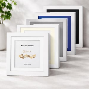 May include: A set of five square picture frames arranged in a row, featuring white, cream, grey, blue, and black borders. Each frame includes a white mount with the text Picture Frame, the OSUK logo, and the words MADE IN UK printed in black.