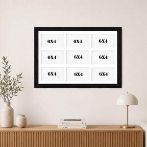 May include: A black rectangular multi-opening picture frame featuring a white mat board with nine individual rectangular slots. Each slot contains a white insert with the black text 6x4 printed in the centre, arranged in a three-by-three grid.