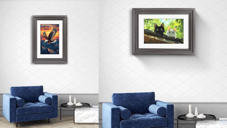May include: Two framed wall art prints displayed in a room. The left print features a bald eagle flying over dark mountains at sunset. The right print shows a black cat and a white cat peering over a wooden roof edge amidst green foliage.
