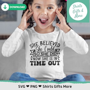 May include: A white long-sleeved shirt with black text that reads "She Believed She Could So She Did Now She Is In Time Out".