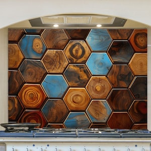 May include: A kitchen backsplash featuring a mosaic of hexagonal wooden tiles. The tiles are a mix of natural wood tones, with accents of blue. The backsplash is installed above a white stove, creating a rustic yet modern aesthetic.