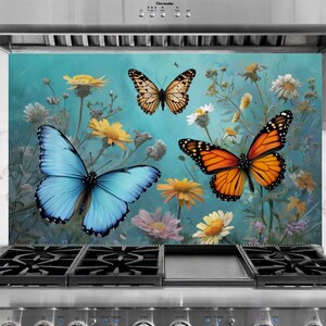 May include: A decorative kitchen backsplash featuring a vibrant illustration of butterflies and wildflowers. The artwork showcases a large blue butterfly, an orange butterfly, and a smaller butterfly against a teal background with yellow and pink flowers.