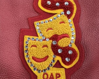 Anpassningsbar teatermask-lapp med strass – applikation i skolfärger