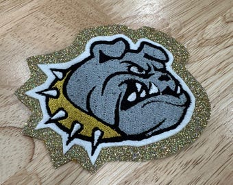 Guldglitter Bulldog-lapp