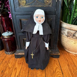 Vintage nun doll, in original box, limited edition, Seymour Mann doll, hand painted, with stand, porcelain nun doll