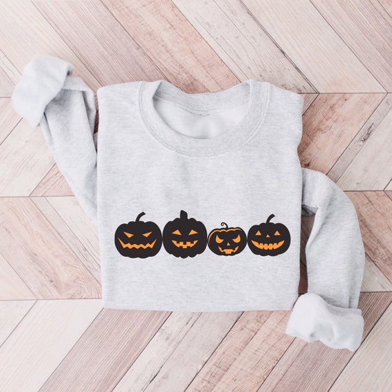 Pumpkin Faces Sweatshirt: Unisex Halloween Crewneck, Fall Sweater