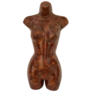 May include: A brown, textured, female torso mannequin.