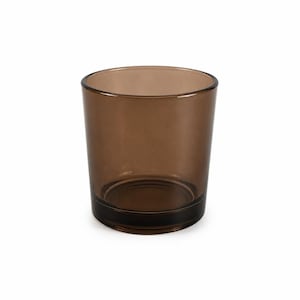 May include: A cylindrical glass vessel featuring a translucent brown tint. The container has a smooth, uniform surface with a thick, solid base and an open top, showcasing a simple, functional design suitable for various household uses.