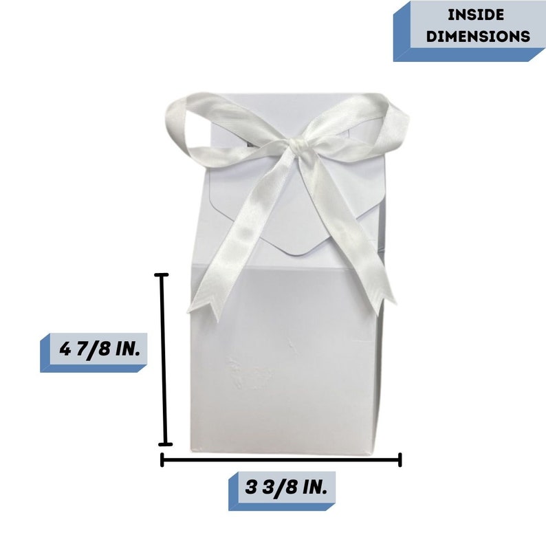 May include: White gift box with a white satin ribbon bow. The box is 4 7/8 inches tall and 3 3/8 inches wide. Inside Dimensions.