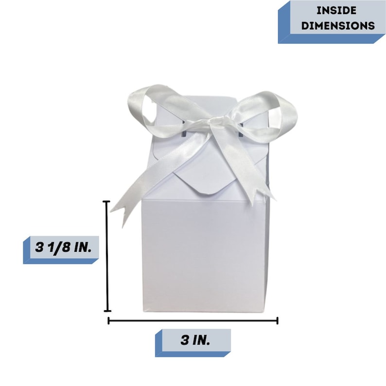 May include: White favor box with a white satin ribbon bow. The box measures 3 inches wide by 3 1/8 inches tall. Inside Dimensions.