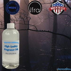 May include: A clear glass bottle with a white label that reads "GeneralWax High Quality Fragrance Oil 16 oz. (473.176 ml)". The bottle is sitting on a dark, blurry background.