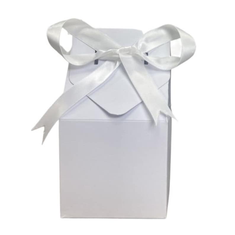 May include: A white gift box with a white satin ribbon tied in a bow on top.