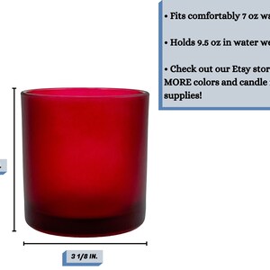 May include: A red glass candle jar with a diameter of 3 1/8 inches and a height of 3 1/8 inches. The jar is designed to hold 7 ounces of wax and 9.5 ounces of water. The text on the image reads: "Fits comfortably 7 oz wax", "Holds 9.5 oz in water weight", "Check out our Etsy store for MORE colours and candle making supplies!"