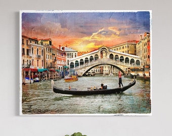 May include: A painting of a gondola on a canal in Venice, Italy. The Rialto Bridge is in the background, and the sky is a vibrant orange and yellow.