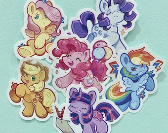 May include: A set of 6 colorful cartoon pony stickers. The ponies are all different colors and have different expressions. The stickers are perfect for adding a touch of whimsy to any project.