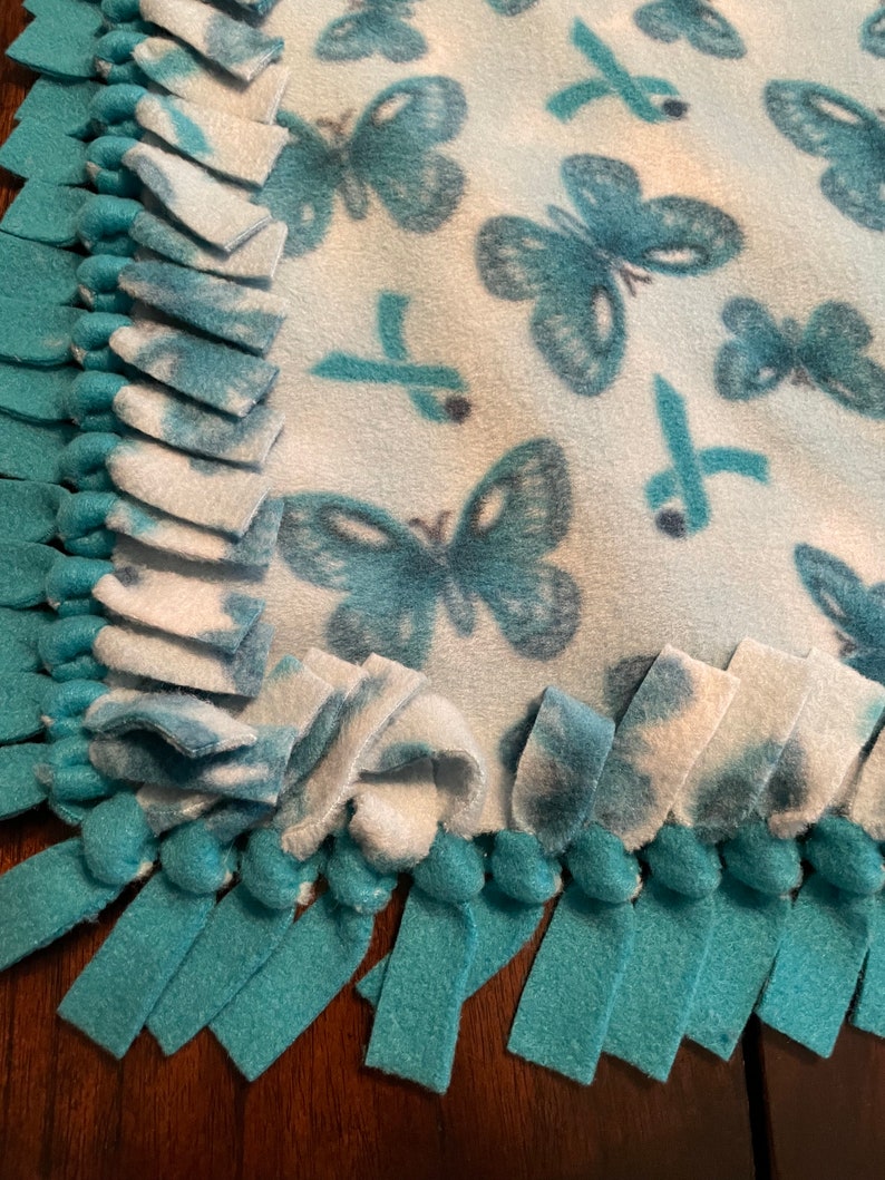 CHILD ABUSE PREVENTION Ribbon 49x34 Nosew Knotted Blanket. Antipill