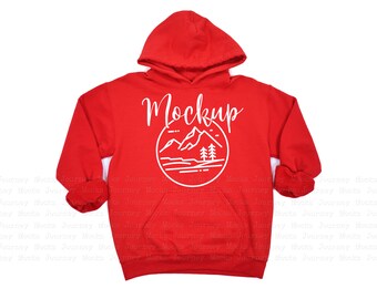 Könnte beinhalten: Roter Kapuzenpullover mit einem weißen Grafikdruck von Bergen und Bäumen und dem Wort "Mockup" in weißer Schrift.