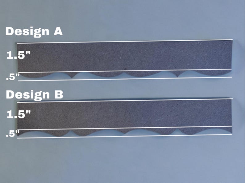 May include: Two rectangular designs labelled A and B, each with a dark grey textured surface. Design A and B are 3.8 cm wide and 1.3 cm high, with a wavy white line. The text "Design A" and "Design B" are visible.