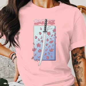 Katana Cherry Blossom Unisex T-Shirt - Japanese Sword Graphic Tee - Samurai Inspired Aesthetic Shirt - Sakura Petals Art - Cool Japan Gift