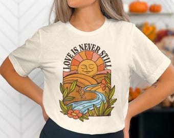 Love Is Never Still Mental Health Unisex T-shirt, Vintage Sun Nature Boho Tee, Positive Affirmation Shirt, Meditation and Yoga Gift