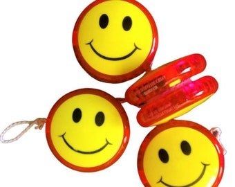 Emoticon Light-up yoyo classic spinning toy 