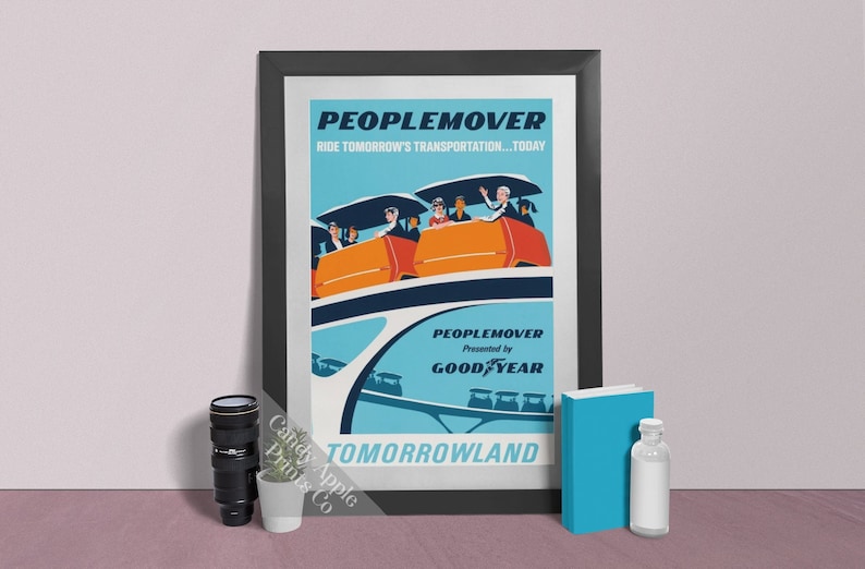 May include: A vintage-style poster advertising the Peoplemover ride at Tomorrowland. The poster features a blue and orange illustration of the ride with people riding in it. The text on the poster reads "Peoplemover, Ride Tomorrow's Transportation...Today!" and "Presented by Goodyear".