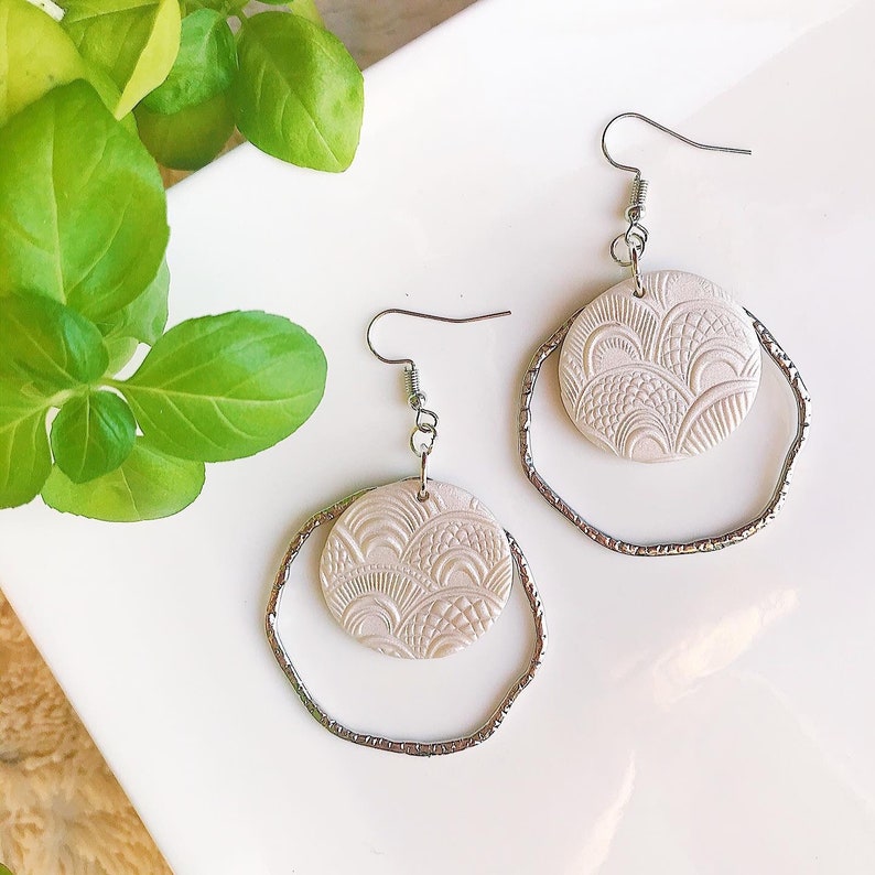 Silver and pearl statement earrings