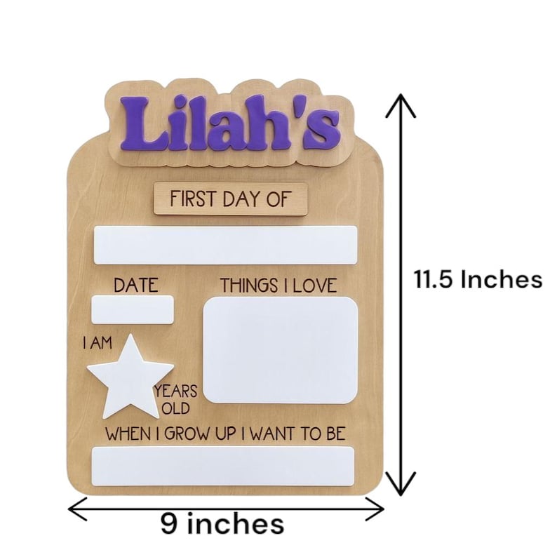 May include: A wooden sign for a child named Lilah, measuring approximately 23 cm wide and 29 cm tall. The sign has spaces for date, interests, and future goals. The name "Lilah's" is in purple letters.