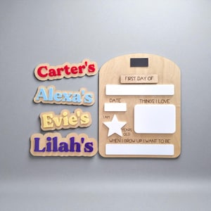 May include: Wooden first day of school sign with name cutouts. The sign has space for the date, things I love, and what I want to be when I grow up. Name cutouts include Carter's, Alexa's, Evie's, and Lilah's.