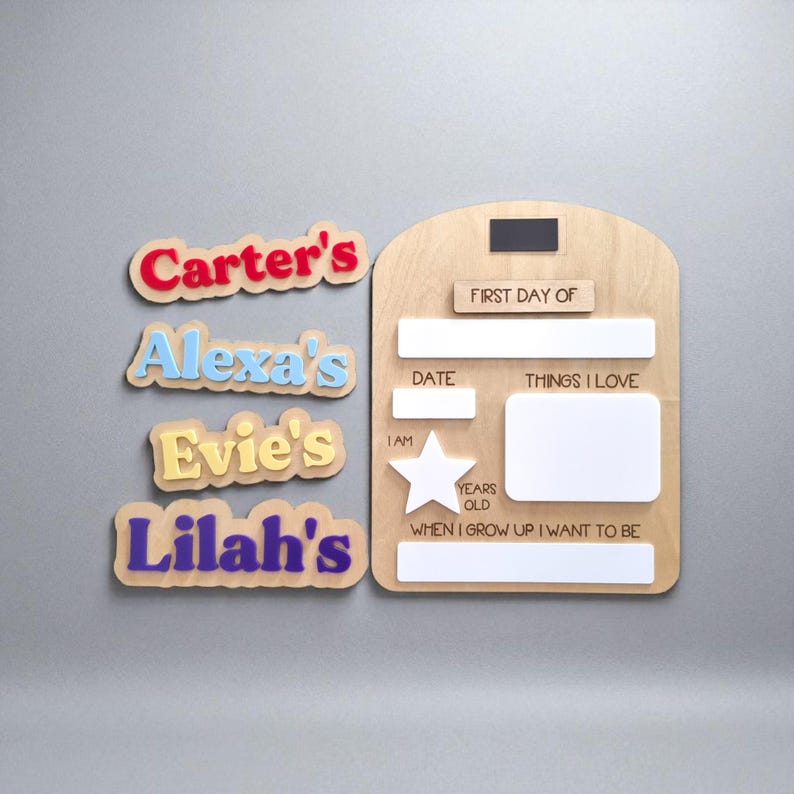 May include: Wooden first day of school sign with name cutouts. The sign has space for the date, things I love, and what I want to be when I grow up. Name cutouts include Carter's, Alexa's, Evie's, and Lilah's.