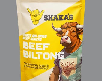 May include: A package of Shaka's Angus air-dried beef snacks, labeled "Beef Biltong." The packaging features a cartoon bull wearing a t-shirt with a hand gesture. The net weight is 8 oz (226 g).
