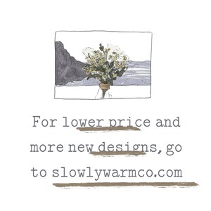 May include: A hand-drawn illustration of a bouquet of white flowers in a vase, with a rocky coastline and ocean in the background. The text "For lower price and more new designs, go to slowlywarmco.com" is below the image.