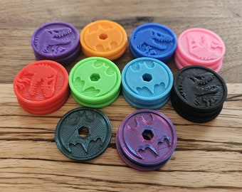 Krążki z zabawkami – grafiki na wielu krążkach – dostępne w ponad 20 kolorach (zestawy po 5 lub 10 sztuk)