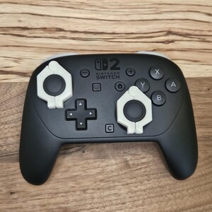 Switch 2 Pro-kontroll - Magnetiska joystickskydd - Stabilisatorer - Lås - Hög kvalitet - 2 st - 20 färger tillgängliga - Skydd bild 2