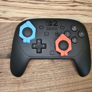 Switch 2 Pro-kontroll - Magnetiska joystickskydd - Stabilisatorer - Lås - Hög kvalitet - 2 st - 20 färger tillgängliga - Skydd bild 3