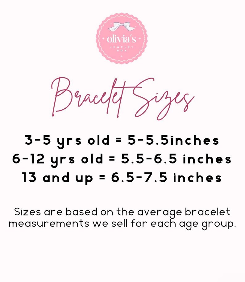 Op de afbeelding: Witte achtergrond met tekst 'Armbandmaten' en logo 'Olivia's Jewelry Box'. Armbandmatentabel: 3-5 jaar = 12,7-14 cm, 6-12 jaar = 14-16,5 cm, 13 jaar en ouder = 16,5-19 cm.