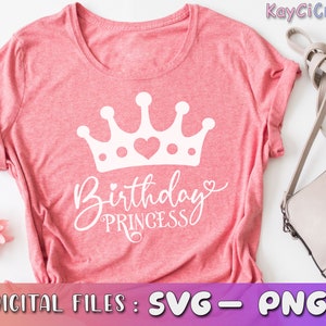May include: A pink t-shirt with a white crown and the text "Birthday Princess" in a cursive font.