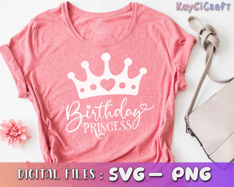 May include: A pink t-shirt with a white crown and the text "Birthday Princess" in a cursive font.