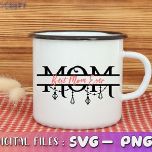 May include: White enamel mug with a black rim and handle. The mug has a black graphic that says "MOM" with a line above and below the letters. The line above the letters says "Best Mom Ever" in pink lettering. The graphic also includes a design of hanging diamonds.