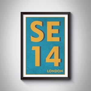 May include: A framed print with a blue background and yellow text that reads "SE14 LONDON".