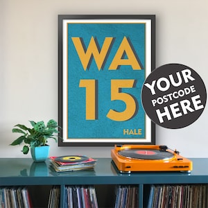 May include: A framed poster with a blue background and yellow text that reads "WA 15 HALE". A black circle with white text reads "YOUR POSTCODE HERE".