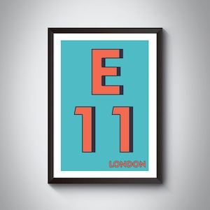 May include: A turquoise blue poster with a black frame. The poster features a large, bold, red number "11" with a black outline. Above the number is a large, bold, red letter "E" with a black outline. The text "LONDON" is printed in black at the bottom of the poster.