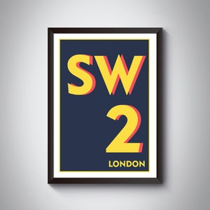 May include: A framed poster with a navy blue background and yellow and red text that reads "SW2 LONDON".
