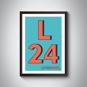 May include: A framed print with a teal background and a red 'L' and '24' in a bold font. The text 'LIVERPOOL' is printed in black below the numbers.