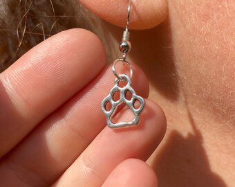 Silver paw print dangle earrings