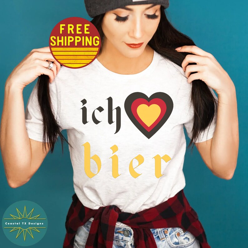 May include: White t-shirt with the text "ich &hearts; bier" in black and yellow lettering. The heart is red, yellow, and black.