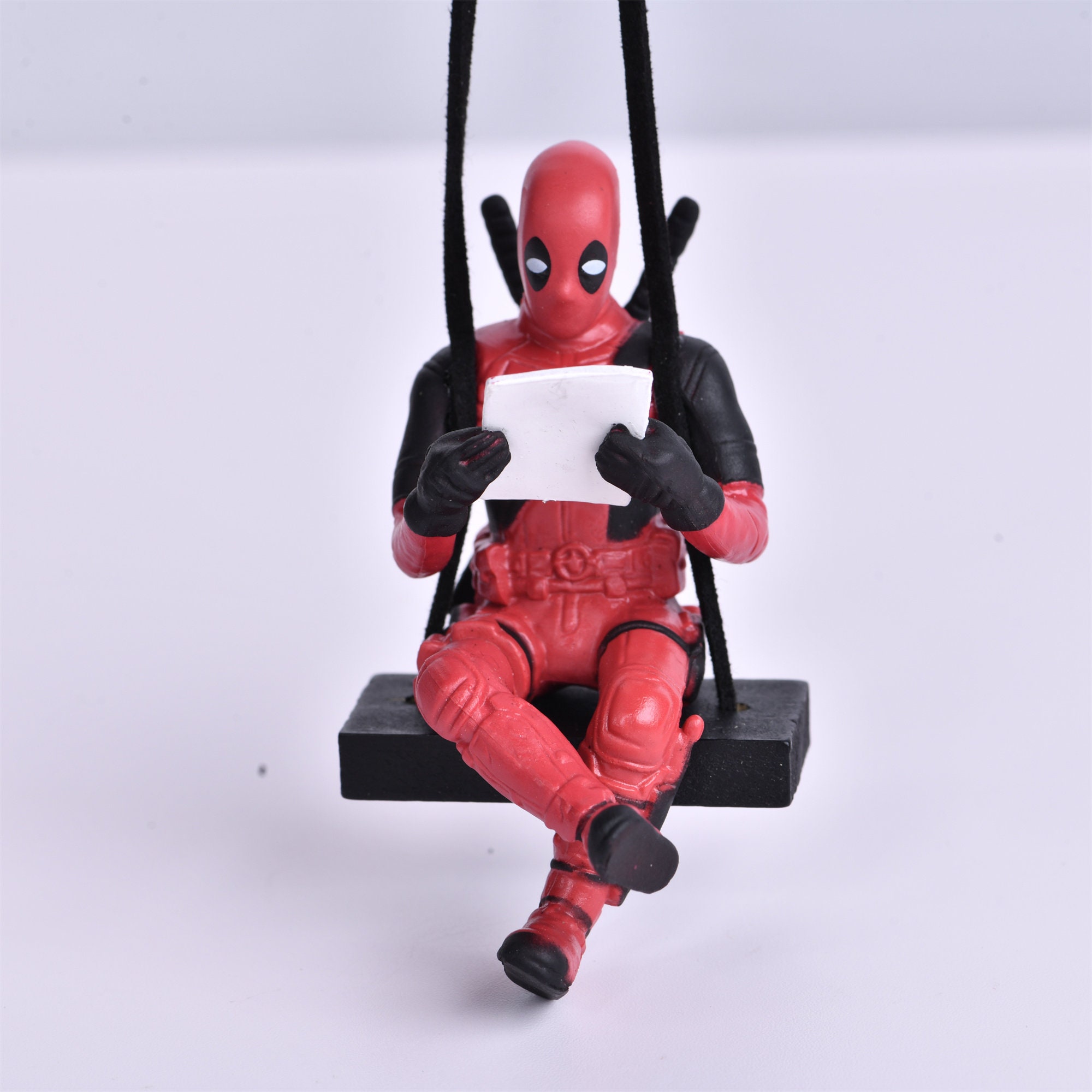 Funny Deadpool Swing Car Ornament, Anime Marvel Mini Pendant Figure,  Reading Deadpool Car Interior Decor, Car Decor, Valentine's Day Gift -   Canada