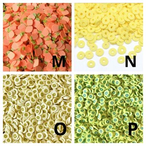 May include: Assortment of colorful fruit-shaped polymer clay charms. The charms are in the shape of pineapples, kiwi slices, and orange slices. The charms are perfect for adding a touch of whimsy to crafts and jewelry.
