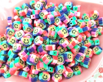 50/100pcs x 10mm kwaliteit leuke regenboog smiley gezicht bloem polymeer klei kralen rekbare armband sieraden kinderen CRAFT UK * NIET eetbaar *